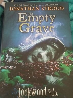 The Empty Grave by Jonathan Stroud - Green & Black Hardcover